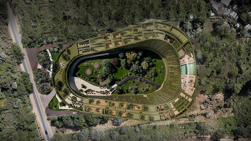 Pandangan udara LTR1 berbentuk oval mengelilingi hutan